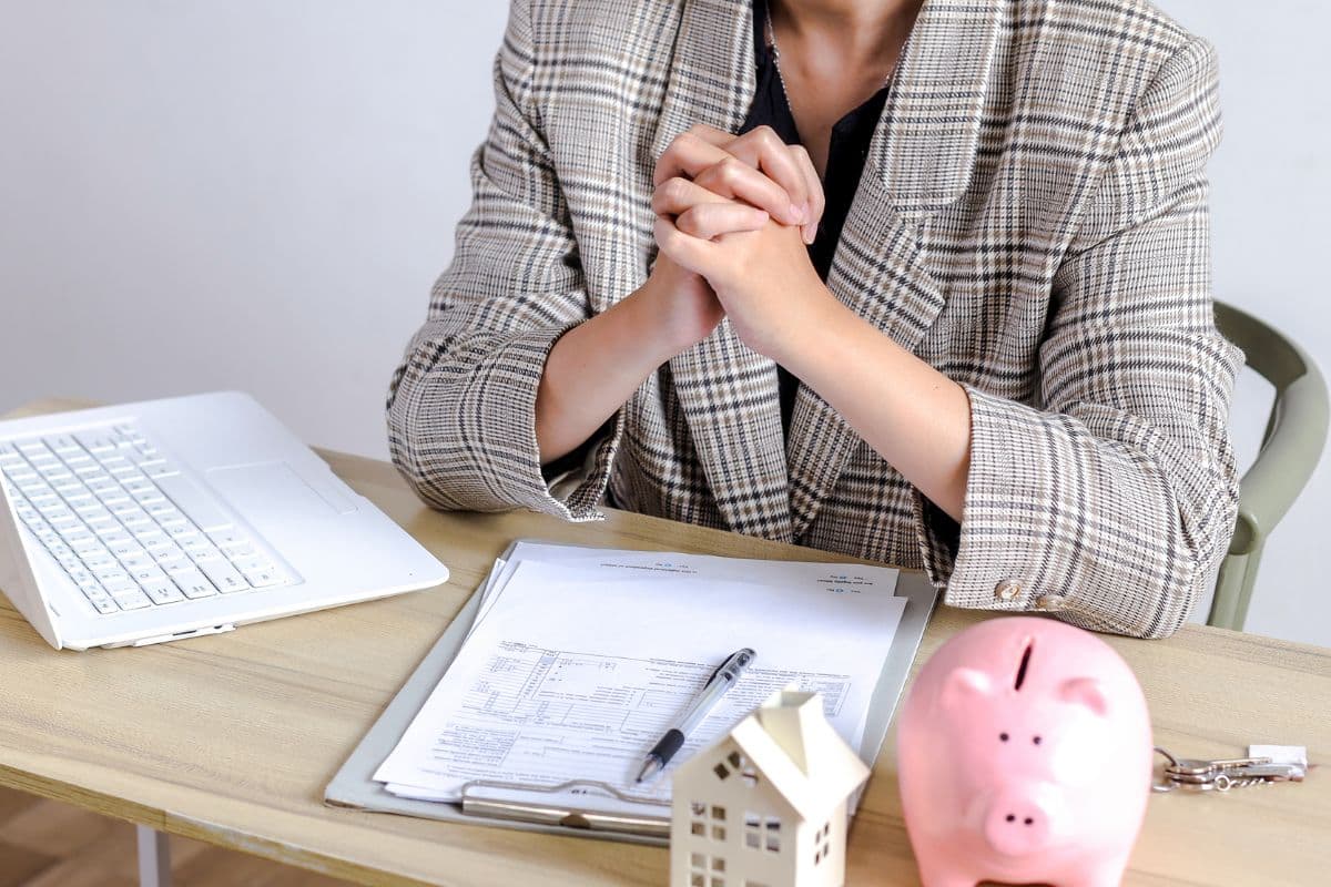 Homeowner reviewing insurance documents for septic system coverage